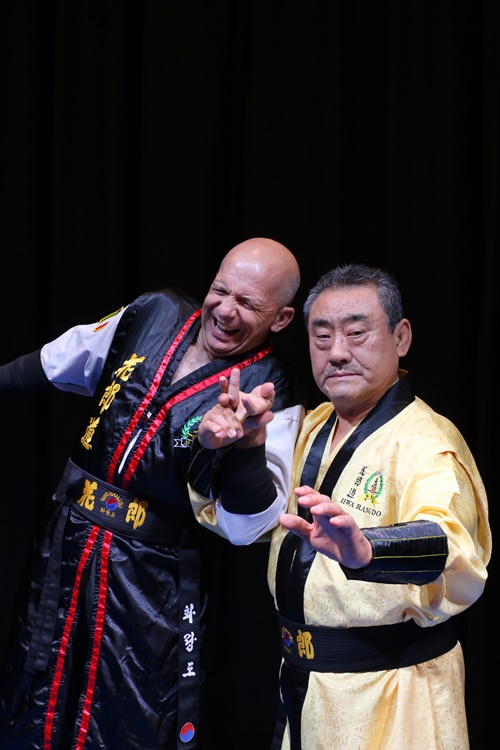 Hwa Rang Do® Founder Supreme Grandmaster Dr. Joo Bang Lee demonstrating a kick defense technique Photo by Andrea Valtriani 