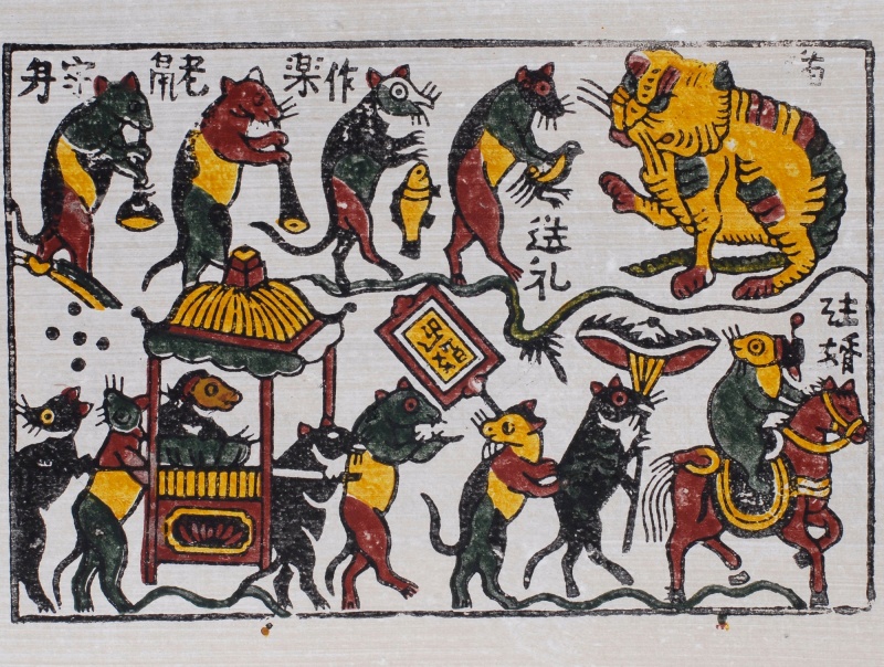 Bức tranh dân gian Đông Hồ mang tên “Đám cưới chuột” với hình tượng mèo đại diện cho tầng lớp cai trị nhưng không hề hung tợn, đi kèm đó nó còn chứa đựng ý nghĩa nhân sinh sâu sắc thể hiện thái độ sống ôn hòa đầy thi vị của người Việt Nam. (Ảnh: Wikimedia Commons)