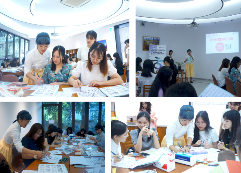 Cô Park tận tình đi đến từng bàn, hướng dẫn từng bạn học viên cách cầm bút, cách điều chỉnh cổ tay,... để có thể tạo ra một tác phẩm thư pháp hoàn chỉnh nhất có thể. (Ảnh: Trần Huyền Phương)