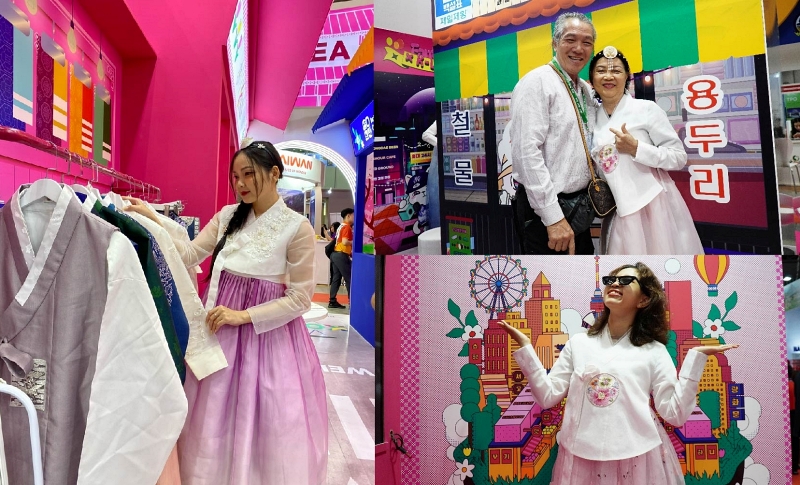 Hào hứng cùng khu vực mặc thử Hanbok truyền thống, gian hàng thu hút nhiều đối tượng khách hàng “hóa thân” thành những cô nàng Hàn Quốc xinh đẹp. (Ảnh: Lê Thị Yến)