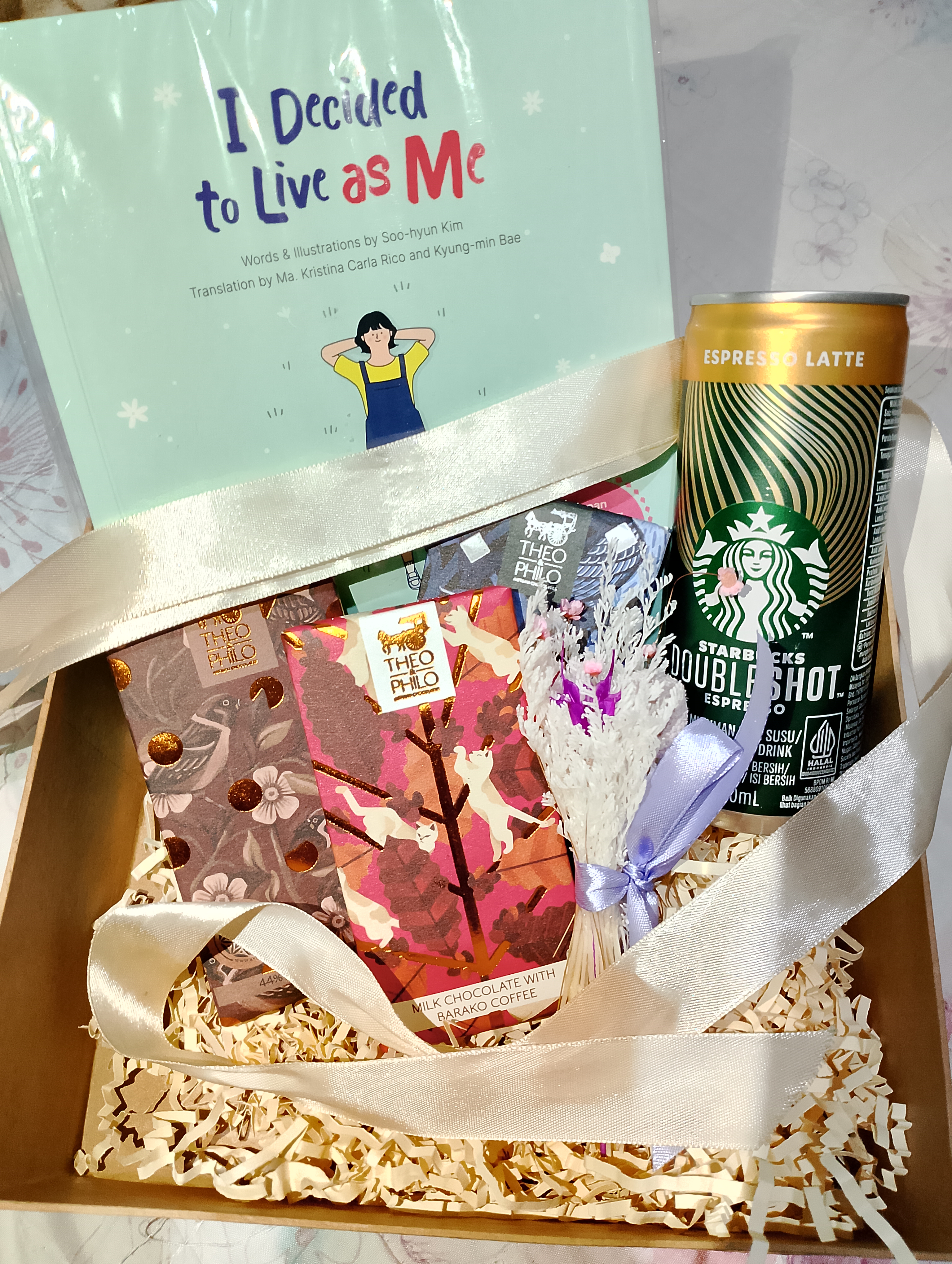 I received a book ( I Decided To Live as Me from APOP), Espresso, and Chocolates from KCC-Phil. on December 14. (John Paul Serraon)